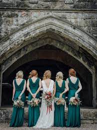 Spring finally feels like it's arrived and all i can think about are gorgeous spring colors and lots of green. November Wedding Emerald Green Bridesmaid Dresses Paired With Burgundy Bouquets And Wedding Cake Colorsbridesmaid