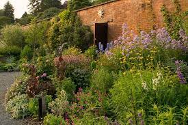 a garden paradise with a view holehird near windermere lake district garden wall garden