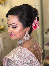 The Neat Flow And The Highlight On Fleek Bridetobe Pink Glam Soft Side Parted Bun With Pink Combo Fl Indian Wedding Hairstyles Lip Hair Pink Glam