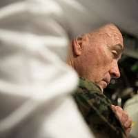 Marines with the 11th Marine Expeditionary Unit patrol