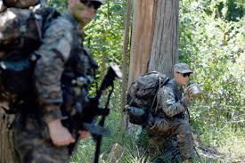 Landon carter, assigned to headquarters, 75th ranger regiment, executes a low crawl while participating in a tactical event during the spc hilda i. In A First Two Women To Graduate From Army S Ranger School Wsj