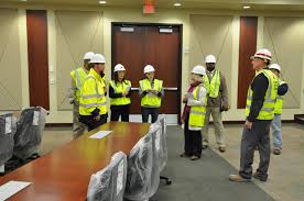 DPW team tours FORSCOM/USARC building to assess custodial and recycling  needs