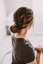 If you have shorter hair, you can also section half your hair up into a top knot. Messy Bun Hairstyles Thatill Still Have You Looking Polished Southern Living