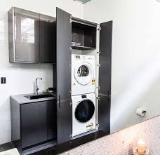 11 Clever Ways To Conceal Your Laundry Ikea Laundry Room Ikea Washing Machine Laundry Cupboard