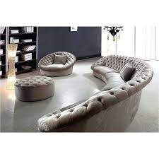 All parts have woody frames and low black feet. View Photos Of Round Sofas Showing 15 Of 20 Photos