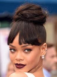 I'm obviously not alone in my adoration, as she's built quite the following. Sleek Hair Bun With Fringes Bun Hairstyles For Prom Askhairstyles