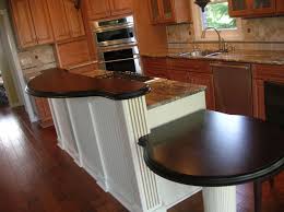Amazing gallery of interior design and decorating ideas of kitchen island with l shaped breakfast bar in decks/patios, dining rooms, kitchens by elite three clear glass globe pendants illuminate a gray kitchen island topped with statuary marble fitted with an l shaped raised breakfast bar lined with. Home Living Blog Kitchen Island With Raised Bar Dimensions