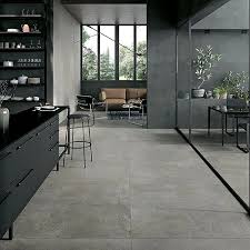 What Type Of Flooring Is The Best For Homes In Frisco Texas Grey Floor Tiles Concrete Tile Floor Concrete Look Tile