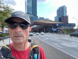 About 9.5 miles from Madison Square Garden (home of the NY Knicks and  Rangers) to Barclays Center in Brooklyn (home of the Nets and Liberty).