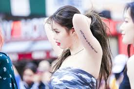 A cross on back of her left shoulder; G I Dle Soojin And Her Many Small Cute Tattoos Starbiz Net