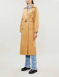 If you can't get enough of a trench shape (large lapels, double breasted, air of british aristocracy), but need something warmer, this harris wharf coat is a good bet. Topshop Cotton Editor Trench Coat In Camel Natural Lyst