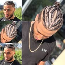 This braided hairstyle, which features a low bun, is kept masculine and modern thanks to its messy and haphazard appearance. Interesting Hairdressing Tips You Should Use Mens Braids Hairstyles Braids For Boys Braided Hairstyles