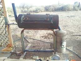 Maybe you would like to learn more about one of these? My Husband Made This From An Old Hot Water Heater A Water Pressure Tank Two Trampoline Legs Wheels From A Plastic Wh Diy Bbq Hot Water Heater Pressure Tanks