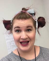 Teachers throwing monkeys at targets for prizes