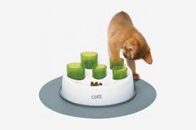 Some feeders feature a tray that rotates exposing the next meal while others simply have a lid that flips when it's time to dispense the food. 18 Best Food Puzzles For Cats And Dogs The Strategist New York Magazine
