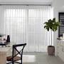 Modern window coverings for large windows from www.blinds.com