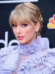 Taylor Swift's Signature Bangs Signify Their Own Eras