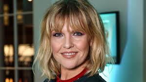 Who is Ashley Jensen, who was the Extras actress's husband Terence Beesley  and what TV shows has she appeared in?