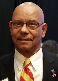 MARVIN NEALS.......Charles Sumner High...alumni.... While playing for coach  James Price at Sumner, the Bulldogs became the first African American high  school to win a Regional in the state of Missouri. Marvin Neals,