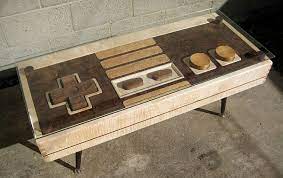 Nes coffee table with 2 outlets and 2 usb ports for the controller slots, 2 huge game cartridge end tables (pick which games you want your end tables to be based on), and 2 giant nes controller coasters (or server trays) are available. Multifunctional Nintendo Controller Coffee Table