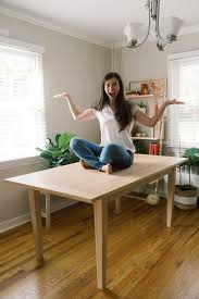 Dining room gallery wall in a farmhouse style dining room with barn door. Easy Diy Modern Dining Table Fancy Look For Less If Only April