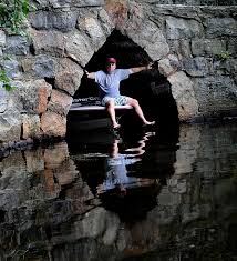 PHOTOS: The tiny tunnel that links Lake Cochituate