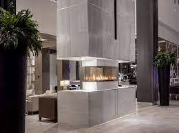 A kitchen island isn't only a functional cooking countertop, it's a part of décor, a storage space, a seating area and it can today we have lots of appliances in the kitchen, there's often not enough space for placing them all. Ortal Island 130 Island Gas Fireplace With Flat Hood Mazzeo S Stoves Fireplaces