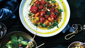 Hummus With Roasted Tomatoes And Almonds Recipe Tomato Recipes Recipes Roasted Tomatoes