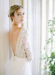 From the dress to the jewelry to the shoes, here's how to pick out every fashion item you need for your wedding day. French Impressionist Wedding Inspiration With Sofia Coppola Style Ruffled Wedding Dress Long Sleeve Lace Wedding Dress With Sleeves Wedding Dresses Lace