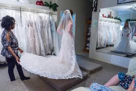 You put a lot of time and research into finding the perfect wedding dress to match your bridal style so there is no shame in showing it off! Military Couples Treated To Free Wedding Gowns In Killeen Military Kdhnews Com