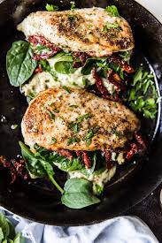 Place a chicken breast on each sandwich, top with some caramelized onions, ½ cup arugula and 1 ounce of crumbled goat. Stuffed Chicken Breast Bouncingrobbit