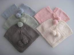 Check out our range of hats. Designer Babywear Eco Friendly New Zealand Merino Wool Baby Poncho Knitting Girls Knitting