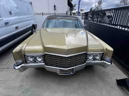 Image result for Medium Gold 1969 Cadillac
