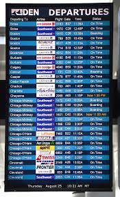 A Departure Board At Denver International Airport In Denver Departures Board Denver International Airport Airport
