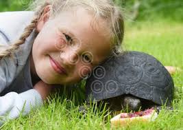 39714633-Tilly Smith, aged nine, with Winnie the tortoise, aged 123 years,  at their home at Brooke.