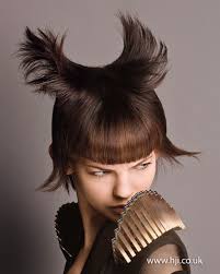 Short bob hairstyles with bangs this year are easily about celebrating the best looks of latest short bob haircuts for ladies. 2015 Brunette Bob Hairstyle With Coloured Fringe