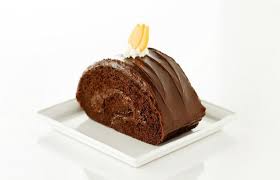 This cake typically comes in a traditional round, sheet cake, or roll cake variation, but it's always moist, nutty, and delicious. Goldilocks Chocolate Roll Photo Courtesy Of Goldilocks Bakeshop Chocolate Roll Chocolate Cake Roll Recipes Goldilocks Cakes