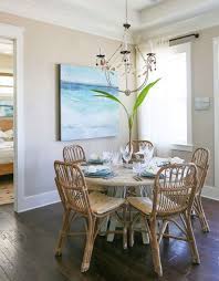Add simple coastal decor with elements like wood beach flag or beach wall art to bring out the beach decor for a coastal dining room in your beach cottage. How To Make A Small Coastal Home Feel Spacious Coastal Room Coastal Dining Room Dining Room Nook