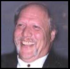 Can someone clean up the blur in a photo of my girlfriend's dad?