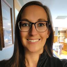 Here's the former Catholic High School, now the STMA Community Education  Building. The students in the foreground are walking down toward the  grandstand and playground area. This photo is from 1970, a