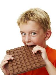 Boy Eating Chocolate' Photographic Print