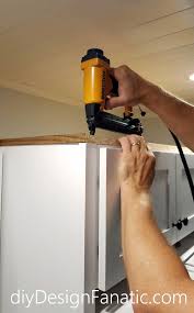You can easily install crown molding on your kitchen cabinets will give your home a finished and sophisticated look. Diy Design Fanatic How To Install Crown Molding On Full Overlay Cabinets