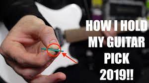 This isn't the only way to hold the pick, but it's pretty standard and will allow for quick peter suggests that you place the pick between your thumb and index finger. How I Hold My Guitar Pick 2019 Youtube