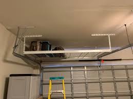 Learn how to build simple, cheap garage storage shelves that use the wasted space above your garage door! 16 Brilliant Saferacks Overhead Garage Storage Ideas Ralston Home Design