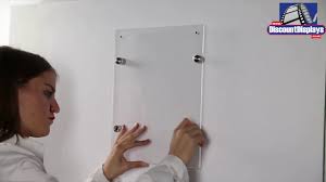 Please call us for a price on our custom. How To Wall Mount Acrylic Poster Holder Discount Displays Youtube
