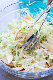 Perfect blend of tangy and sweet, and with no mayonnaise so it is safe for picnics and cookouts! Creamy Apple Slaw Kristine S Kitchen
