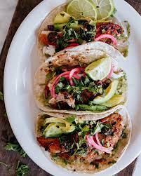 To assemble, place a small handful of cabbage onto a warm tortilla. Spicy Halibut Fish Tacos Spicy Fish Tacos Spicy Recipes Fish Tacos
