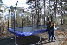 How much fun do kids really have on trampolines? Skywalker 9x15 Trampoline Review Solid Choice For Mini Gymnasts