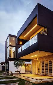 Contrasting Space Design At The Haven Kulai By Code Red Studio House Renovation Design House Designs Exterior House With Balcony