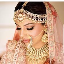 Indian Wedding Bride Soft Glam Makeup Look Of The Indian Bride With Elaborate Indian Bridal Jewe Glam Wedding Makeup Bridal Makeup Looks Indian Bridal Makeup